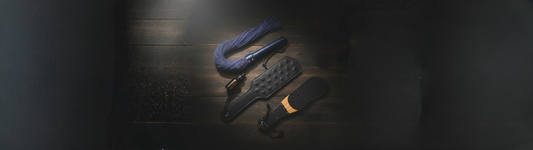 The Art of Impact Play: A Sensory Journey Through Paddles and Floggers